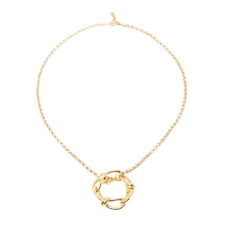 This Balenciaga Continuity bow design is subtle and charming. Made from gold-tone metal, the chain link necklace has a lobster clasp closure. Wear it with your everyday looks for a touch luxury.

Includes: Original Box

