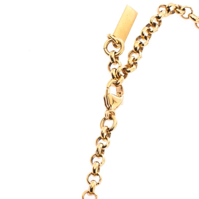 Contemporary Balenciaga Continuity Bow Gold Tone Circular Pendant Necklace