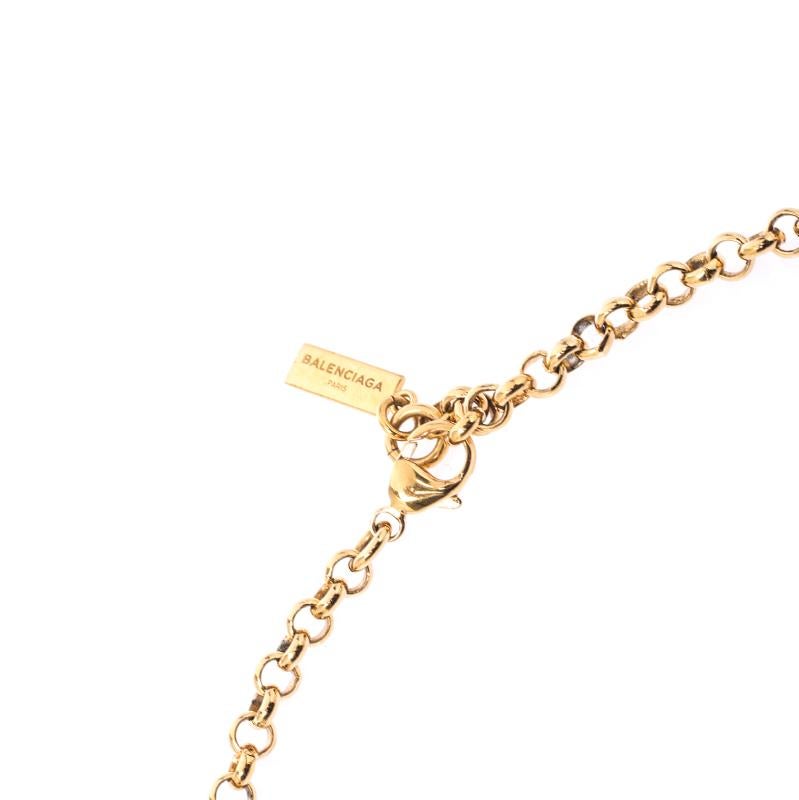 Balenciaga Continuity Bow Gold Tone Circular Pendant Necklace In Good Condition In Dubai, Al Qouz 2