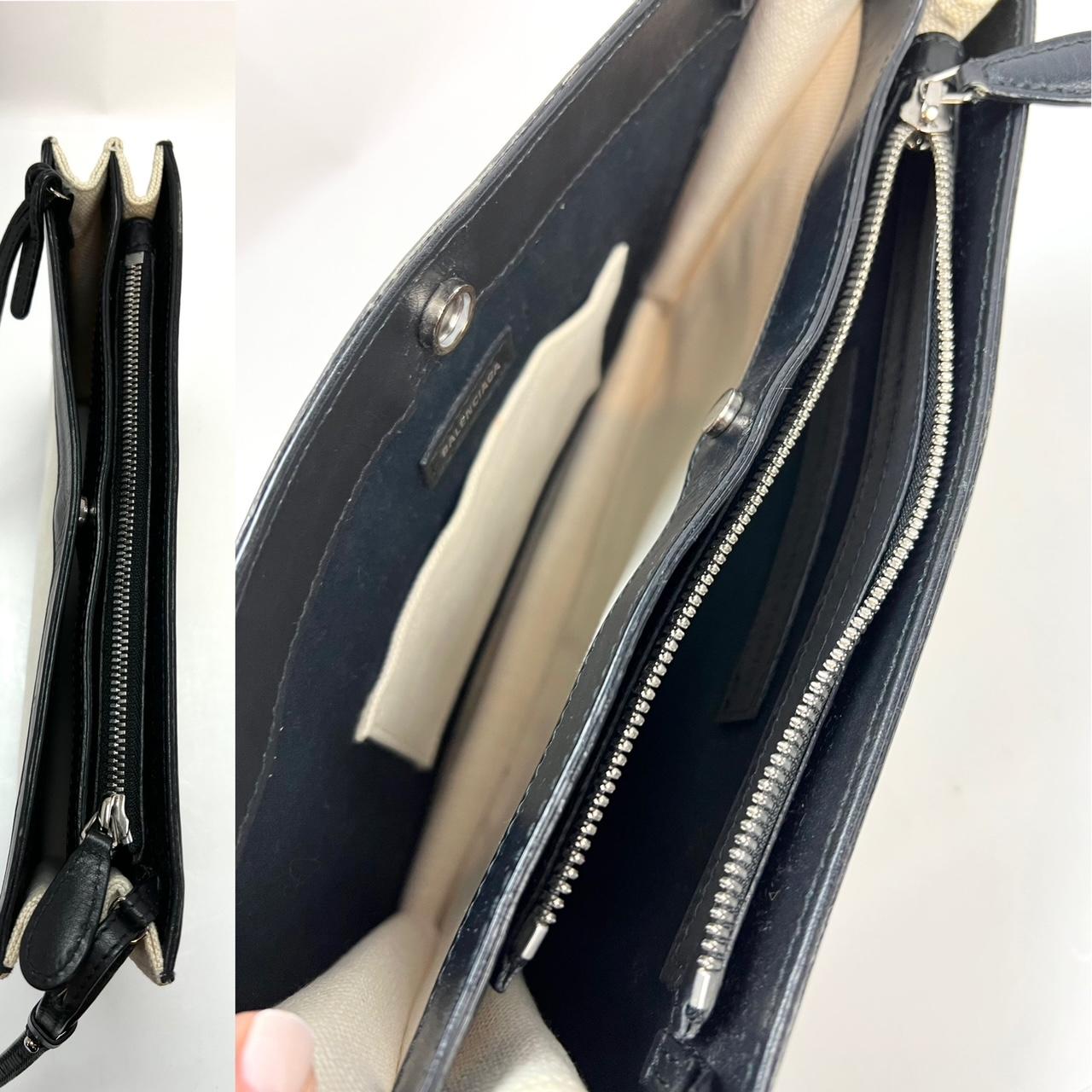 Pre-Owned  100% Authentic
Balenciaga Cotton Canvas Pochette Off White Crossbody
Black Leather Trim
RATING: B...Very Good, well maintained, 
shows minor signs of wear
MEASUREMENTS: H 7.5'' x L 10.1'' x W 2''
HARDWARE: silver
HANDLE DROP: adjustable