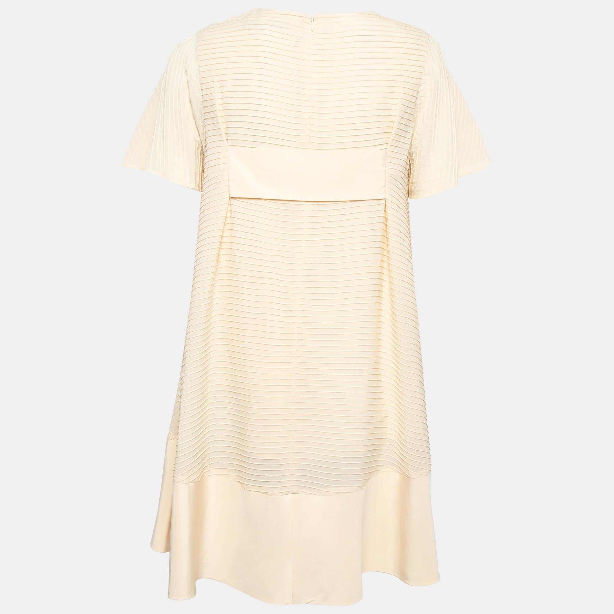 Experience the joy of expert tailoring with this designer dress for women. Meticulously made, it offers a flawless fit and luxe details, ensuring unmatched comfort. This beautiful creation will elevate your style effortlessly.