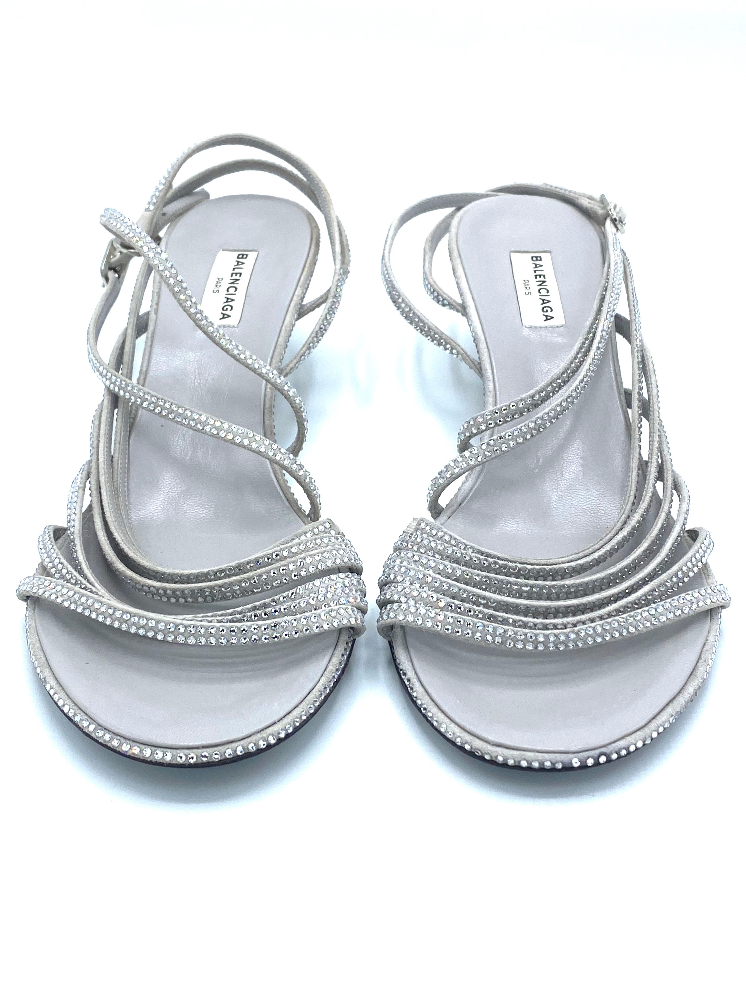Product details:

Featuring grey suede with crystal detail, strappy style with low heel, measures approx. 60mm/ 2.5