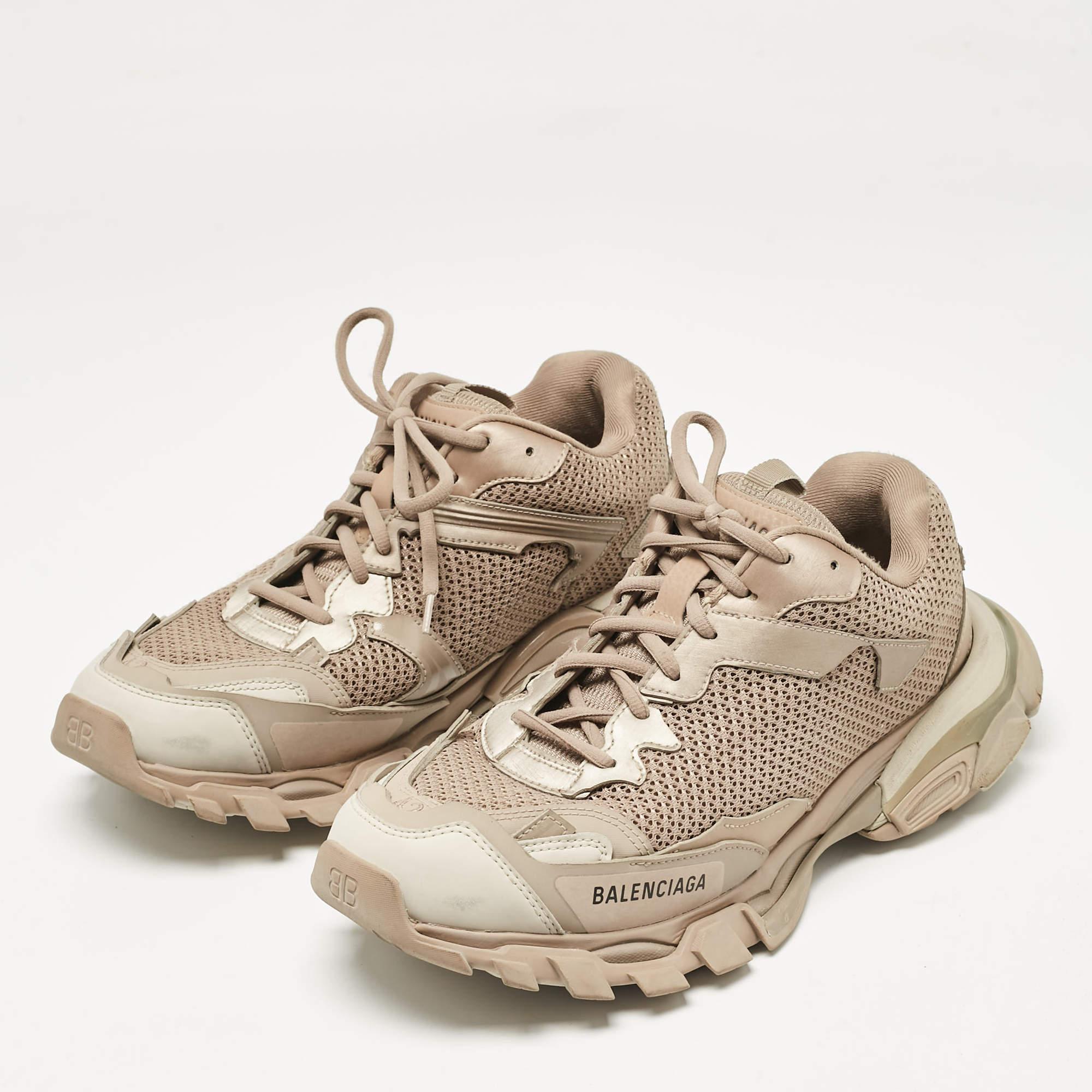 Step into effortless luxury with these Balenciaga sneakers. These luxe kicks offer a harmonious blend of style and comfort  perfect for those who demand sophistication in every step.