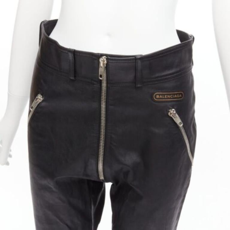 BALENCIAGA Demna 2017 logo patch silver zip cropped moto leather pants FR40 L
Reference: TGAS/D00651
Brand: Balenciaga
Designer: Demna
Collection: 2017
Material: Leather
Color: Black
Pattern: Solid
Closure: Zip Fly
Extra Details: Crafted from thick