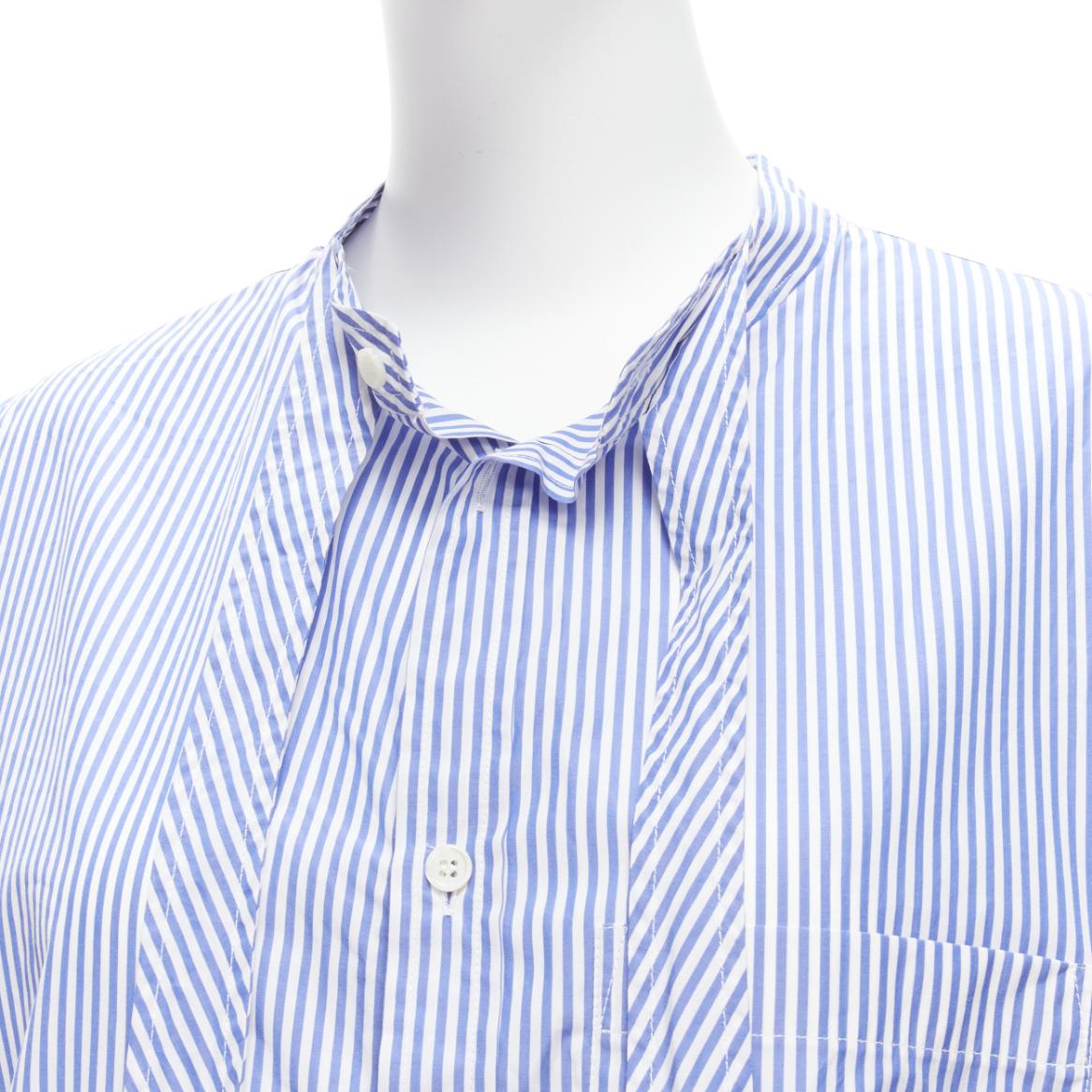 BALENCIAGA Demna 2017 red BB logo blue white stripe oversized shirt FR34 XS
Reference: TGAS/D00370
Brand: Balenciaga
Designer: Demna
Collection: 2017
Material: Cotton
Color: Blue, White
Pattern: Striped
Closure: Button
Extra Details: BALENCIAGA logo