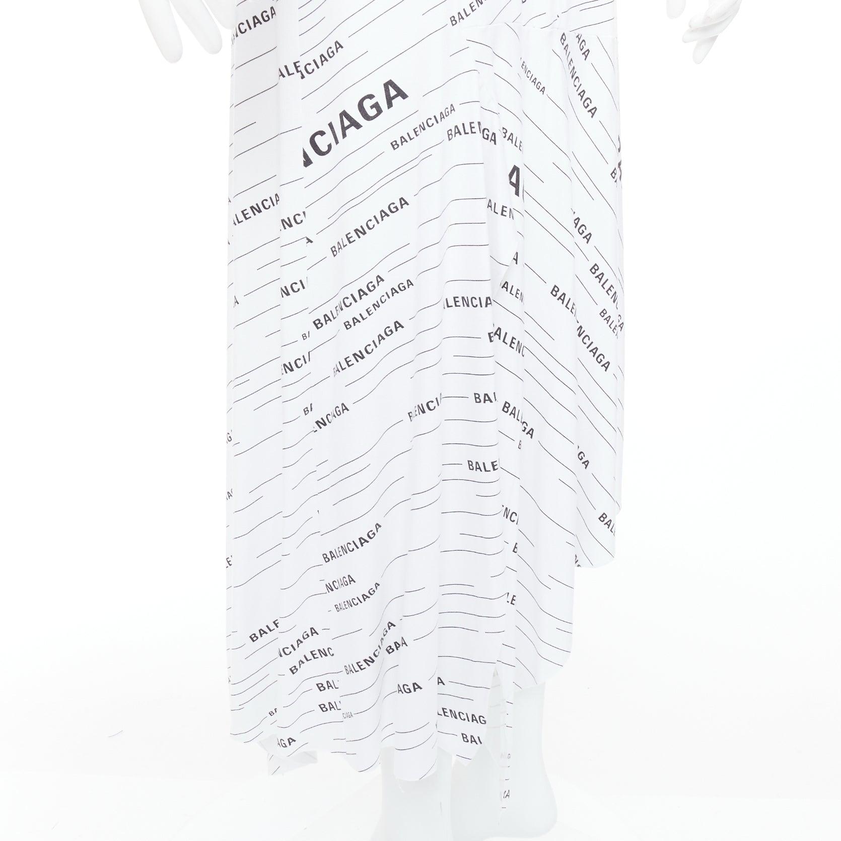 BALENCIAGA Demna 2018 white black logo print asymmetric midi skirt FR38 M
Reference: KNLM/A00330
Brand: Balenciaga
Designer: Demna
Collection: 2018
Material: Jersey
Color: White, Black
Pattern: Logomania
Closure: Zip
Extra Details: An an embrace of