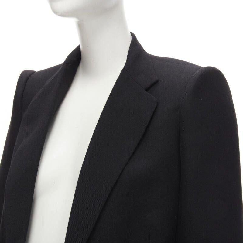 BALENCIAGA DEMNA 2019 blazer oversize de lana negra con hombros acolchados FR34 XS
Referencia: KEDG/A00238
Marca: Balenciaga
Diseñadora: Demna
Colección: 2019
Material: Lana
Color: Negro
Patrón: Sólido
Forro:  Totalmente forrado
Detalles