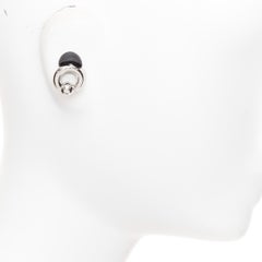 BALENCIAGA Demna 2024 Berlin Ball Ear Jewls: paio di orecchini a bottone in ottone