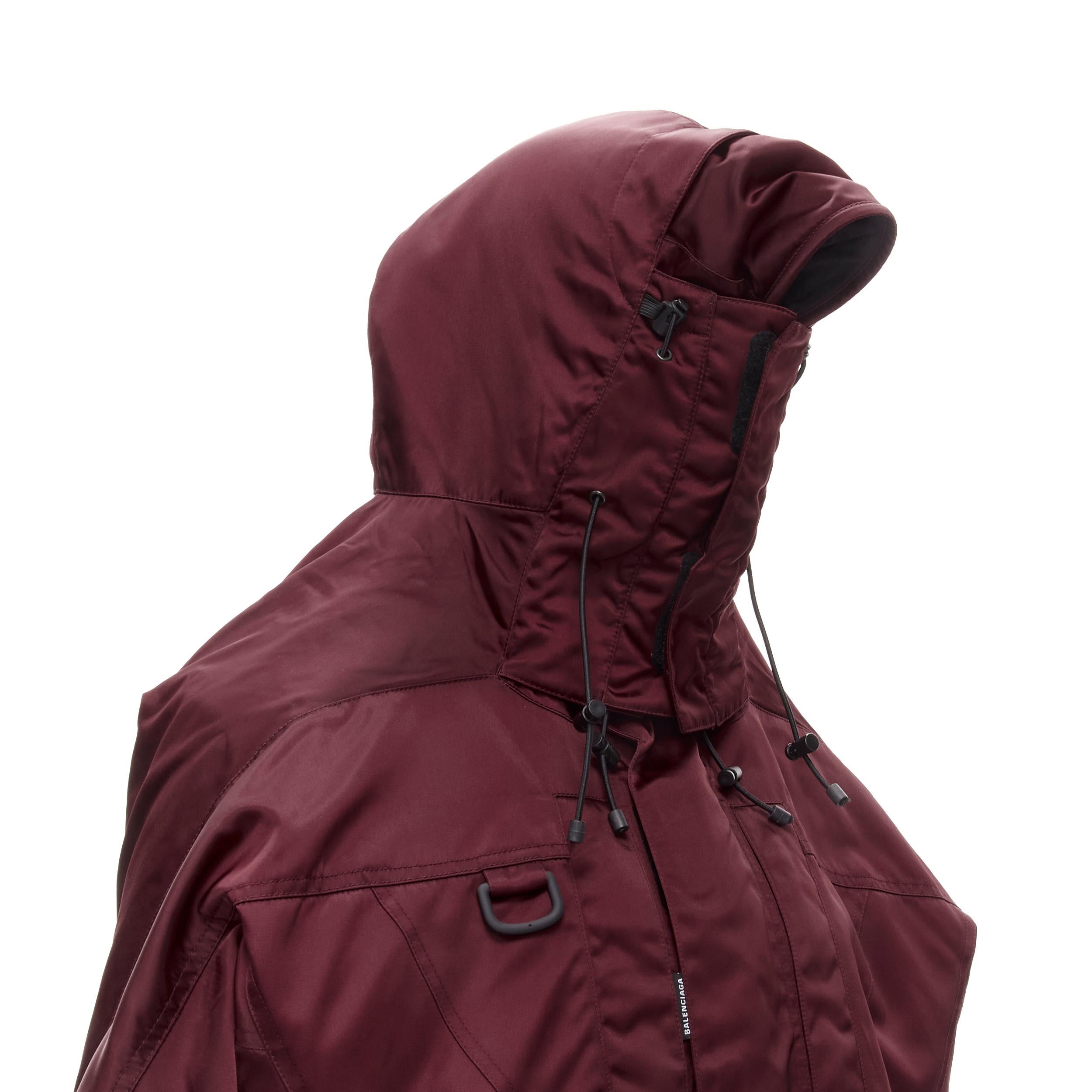 BALENCIAGA Demna burgundy red oversized hooded quilted ski jacket coat
Brand: Balenciaga
Designer: Demna
Color: Burgundy
Pattern: Solid
Closure: Zip
Extra Detail: Techno Synthetic nylon fabric, logo on side front zip, hooded collar, single breasted,