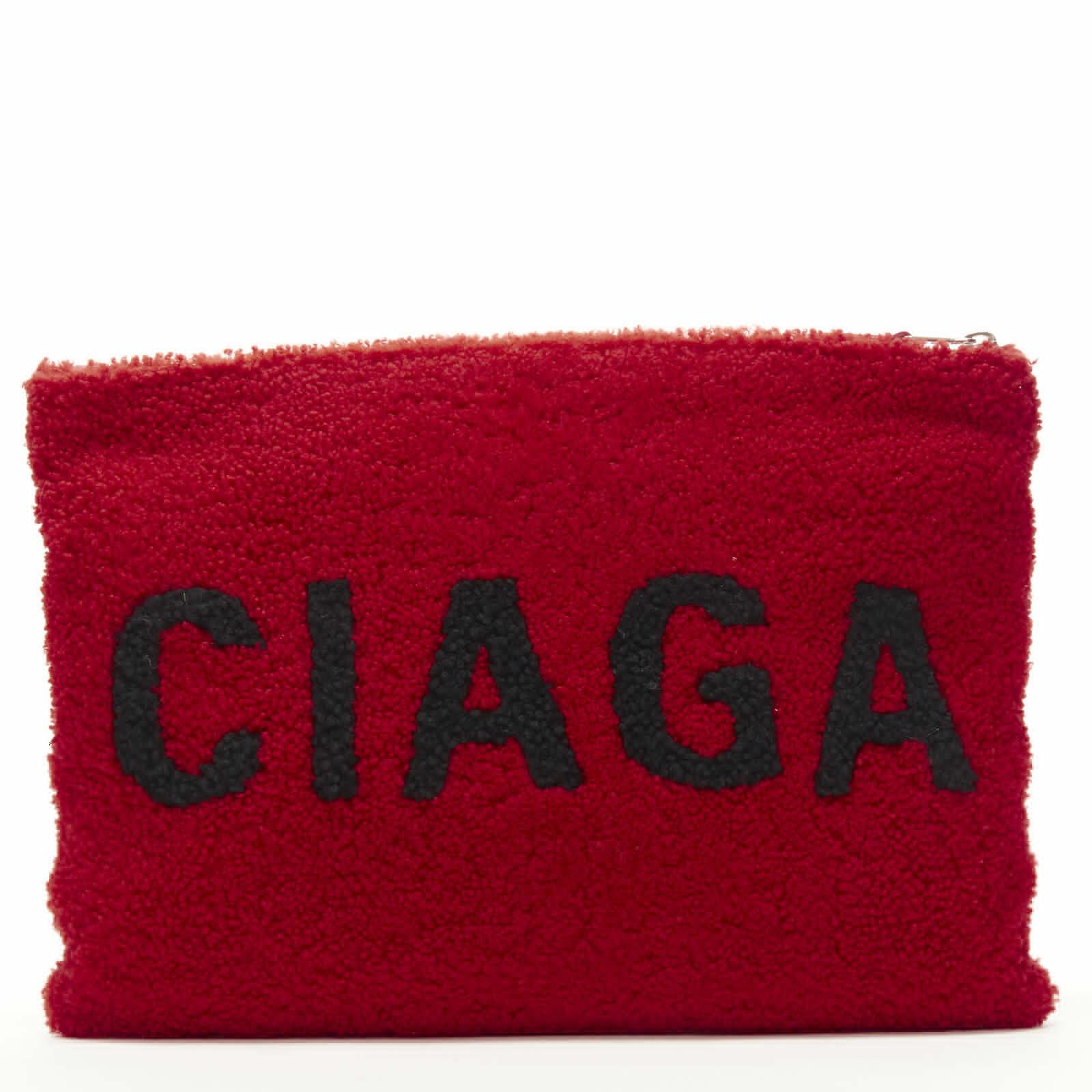 BALENCIAGA Demna logo red black dyed merino lamb shearling zip clutch bag In Excellent Condition For Sale In Hong Kong, NT