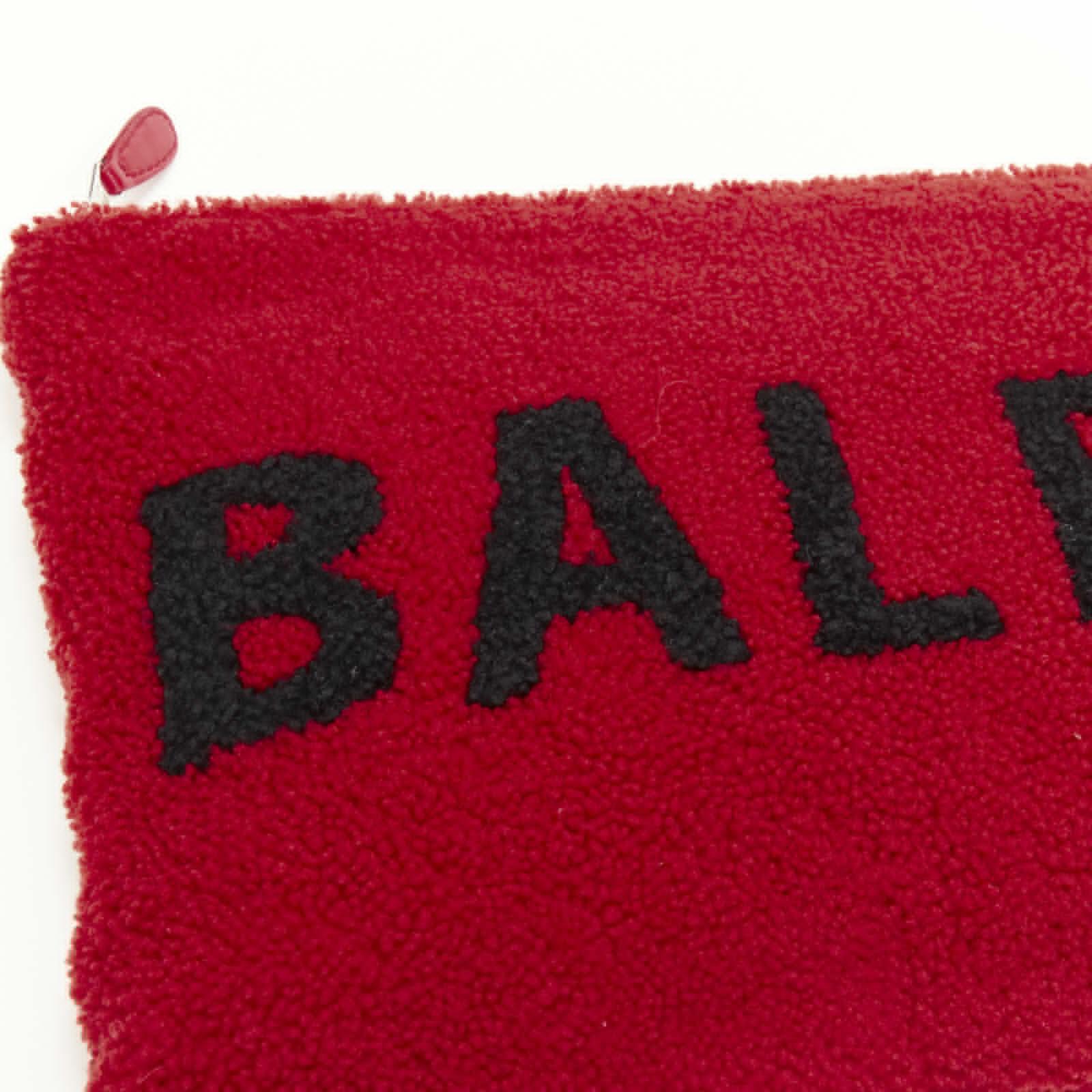 BALENCIAGA Demna logo red black dyed merino lamb shearling zip clutch bag For Sale 1