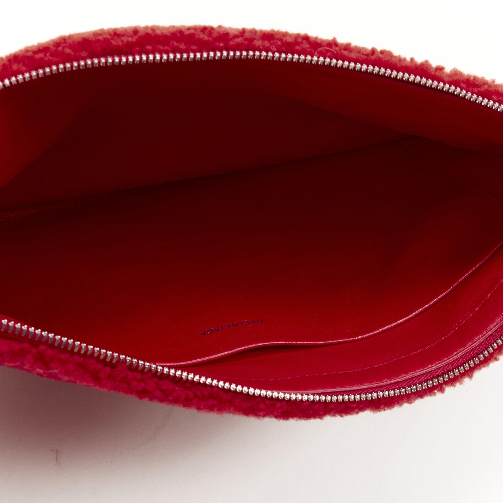 BALENCIAGA Demna logo red black dyed merino lamb shearling zip clutch bag For Sale 2