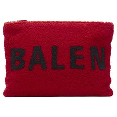 BALENCIAGA Demna logo red black dyed merino lamb shearling zip clutch bag