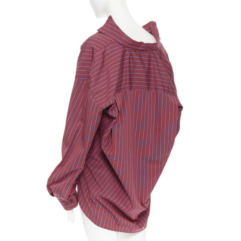 BALENCIAGA DEMNA red blue stripe cotton off shoulder oversized shirt Fr36 S
Reference: LNKO/A01272
Brand: Balenciaga
Designer: Demna Gvasalia
Collection: 2017 
Material: Cotton
Color: Red
Pattern: Striped
Closure: Button
Extra Detail: Patch front