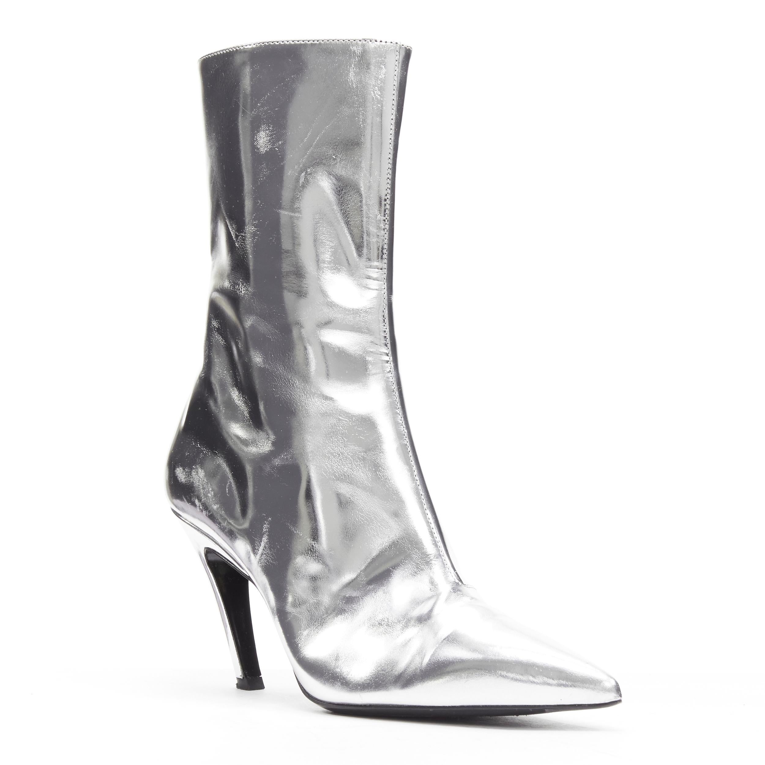 BALENCIAGA Demna silver metallic mirrored leather high ankle boots EU38
Reference: LNKO/A02140
Brand: Balenciaga
Designer: Demna
Material: Leather
Color: Silver
Pattern: Solid
Closure: Zip
Lining: Black Leather
Extra Details: Inside zip.
Made in: