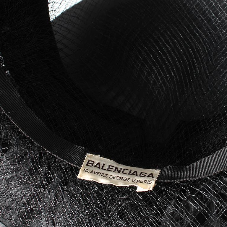 Women's Balenciaga black silk and mesh hat with floral embellishment, c. 1960