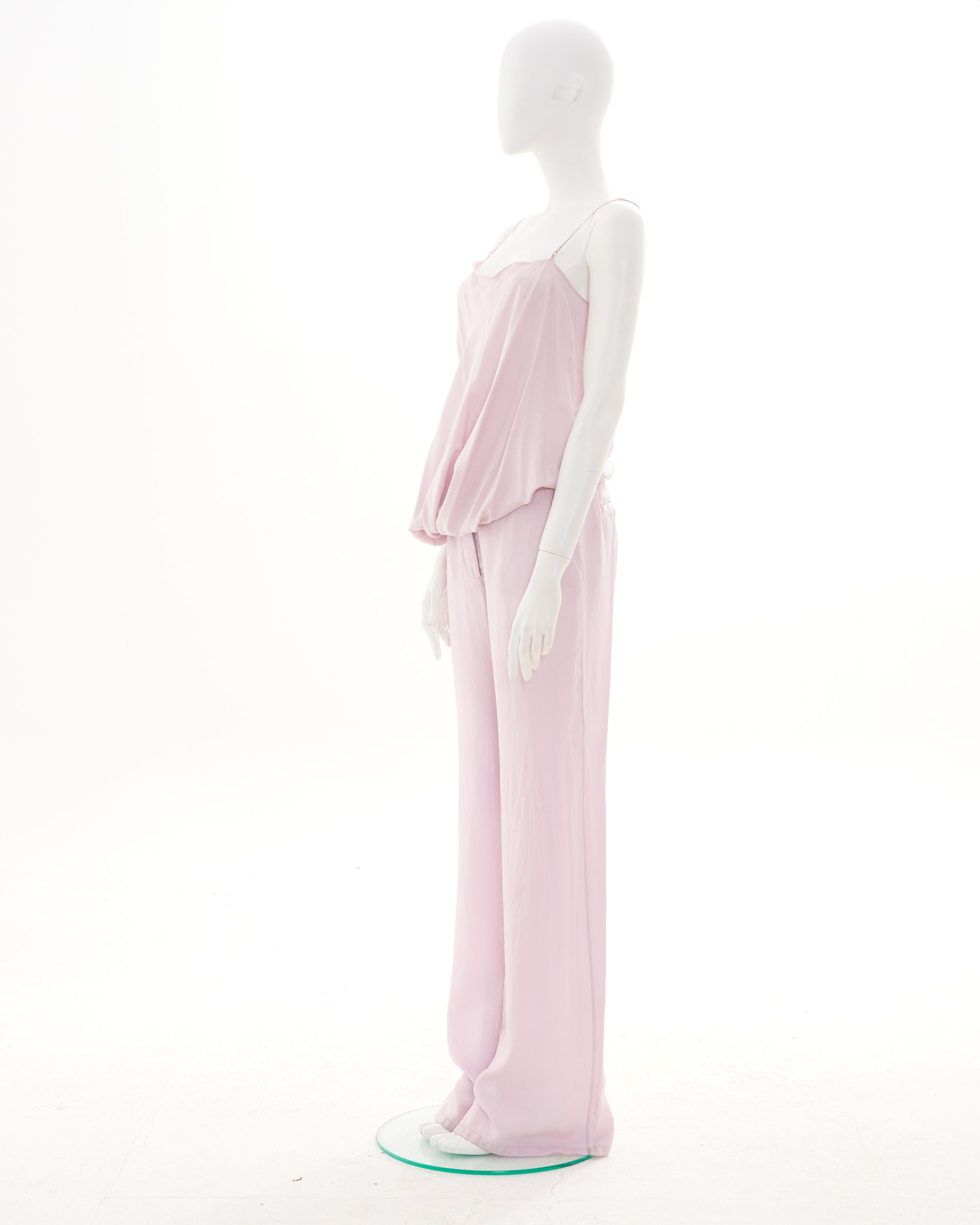 - Designed by Nicolas Ghesquière
- Early 2000s
- Pink Sleeveless Top
- Bootcut Pants
- Made in France
- Materials: Silk
- Size: FR 40 - EN 44 - UK 12 - US 8 (EU)