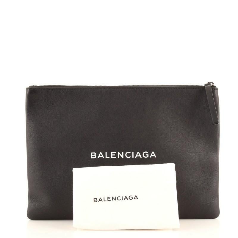 Condition: Great. Minor scuffs and wear on exterior, scratches on hardware.
Accessories: Dust Bag
Measurements:
Designer: Balenciaga
Model: Everyday Logo Pouch Printed Leather Large
Exterior Material: Leather
Exterior Color: Black
Interior Material:
