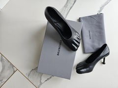 Balenciaga Fetish pumps characteristicof Demna Gvasalia's provocative style.Sold