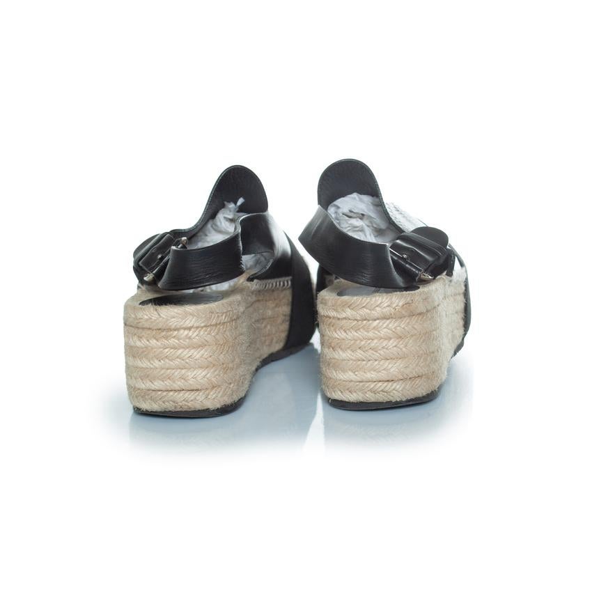Balenciaga, Flat leather raffia sandals 1