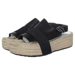 Balenciaga, Flat leather raffia sandals