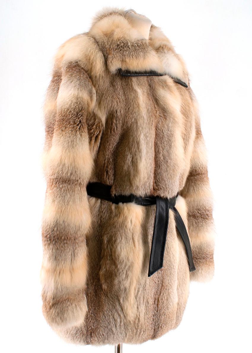 Balenciaga Fox Fur Coat with Leather Belt 

- Leather Hemline on Collar 
- Long Sleeves
- Hidden Hook Front Fastenings
- Fully Lined Interior 

80% Renard Fox Fur 
20% Lamb Skin Leather 

100% Rayon Lining 

Made in Italy 

Please note, these items