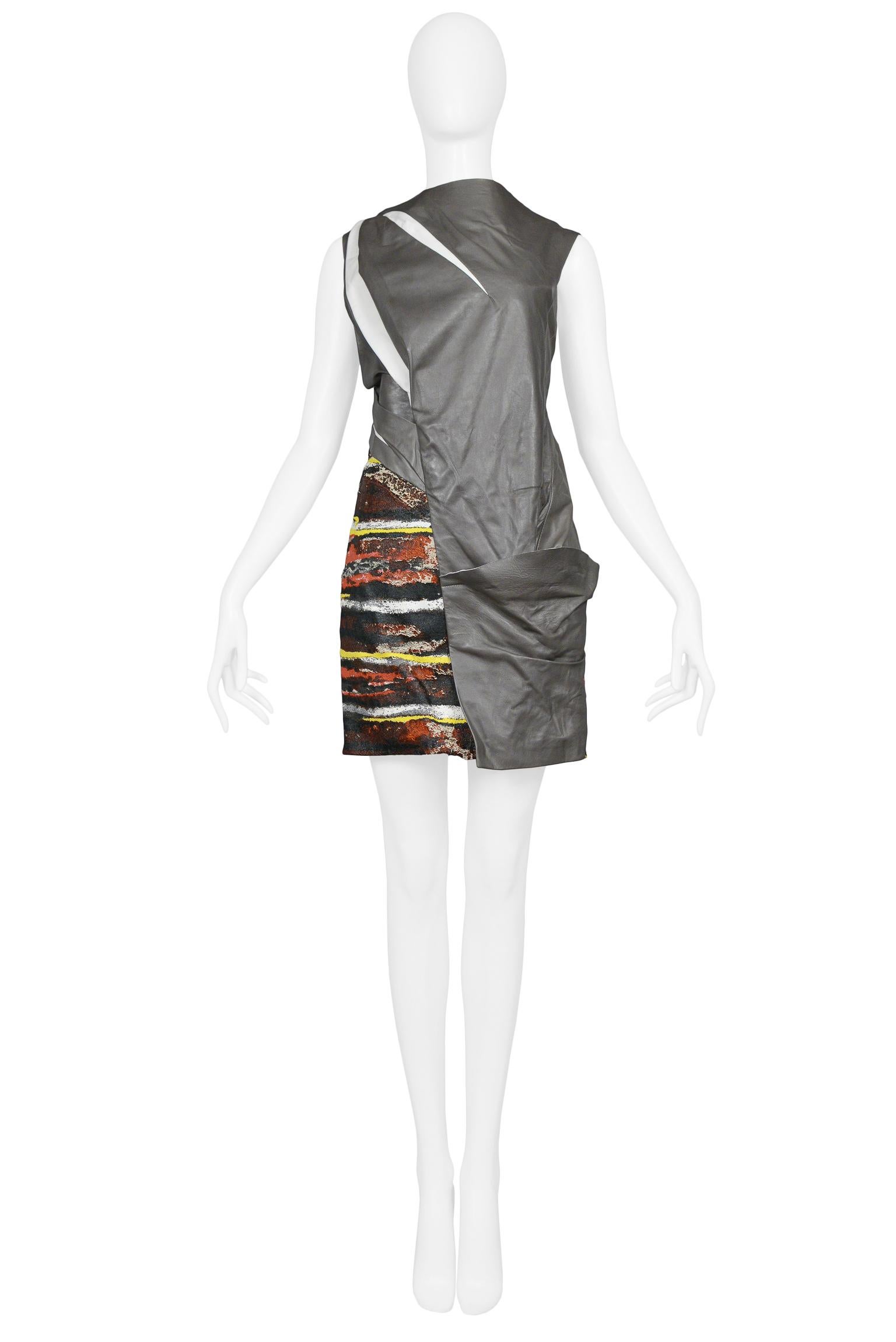 Resurrection Vintage is excited to offer a vintage Balenciaga by Nicolas Ghesquiere grey asymmetrical slashed leather dress featuring white leather trim and insets, a multicolor marbled paint splatter leather under-dress with a unique texture, and