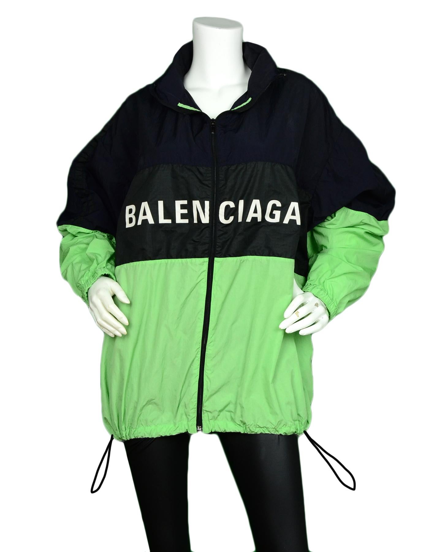Balenciaga Green Black Navy Color-block Zip Front Logo Windbreaker Jacket sz FR34

Made In: Italy
Color: Green, Navy, Black
Materials: 100% Polyester, 100% Polyamide
Lining: 100% Polyester, 100% Polyamide
Opening/Closure: Front zip
Overall