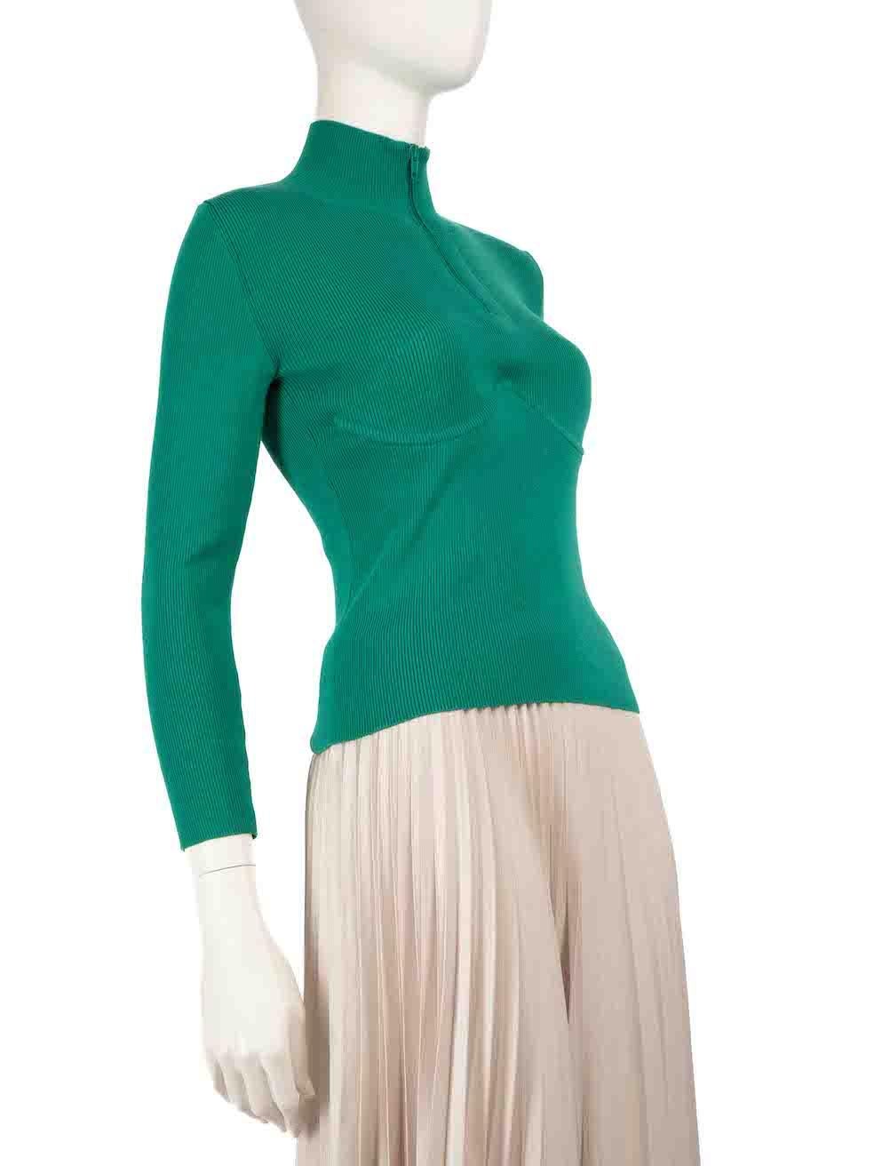 CONDITION is Very good. Minimal wear to top is evident. Minimal discolouration on the lower front left section of the top on this used Balenciaga designer resale item.
 
 Details
 Green
 Cotton
 Ribbed knit top
 Long sleeves
 Mock neck
 Half zip
