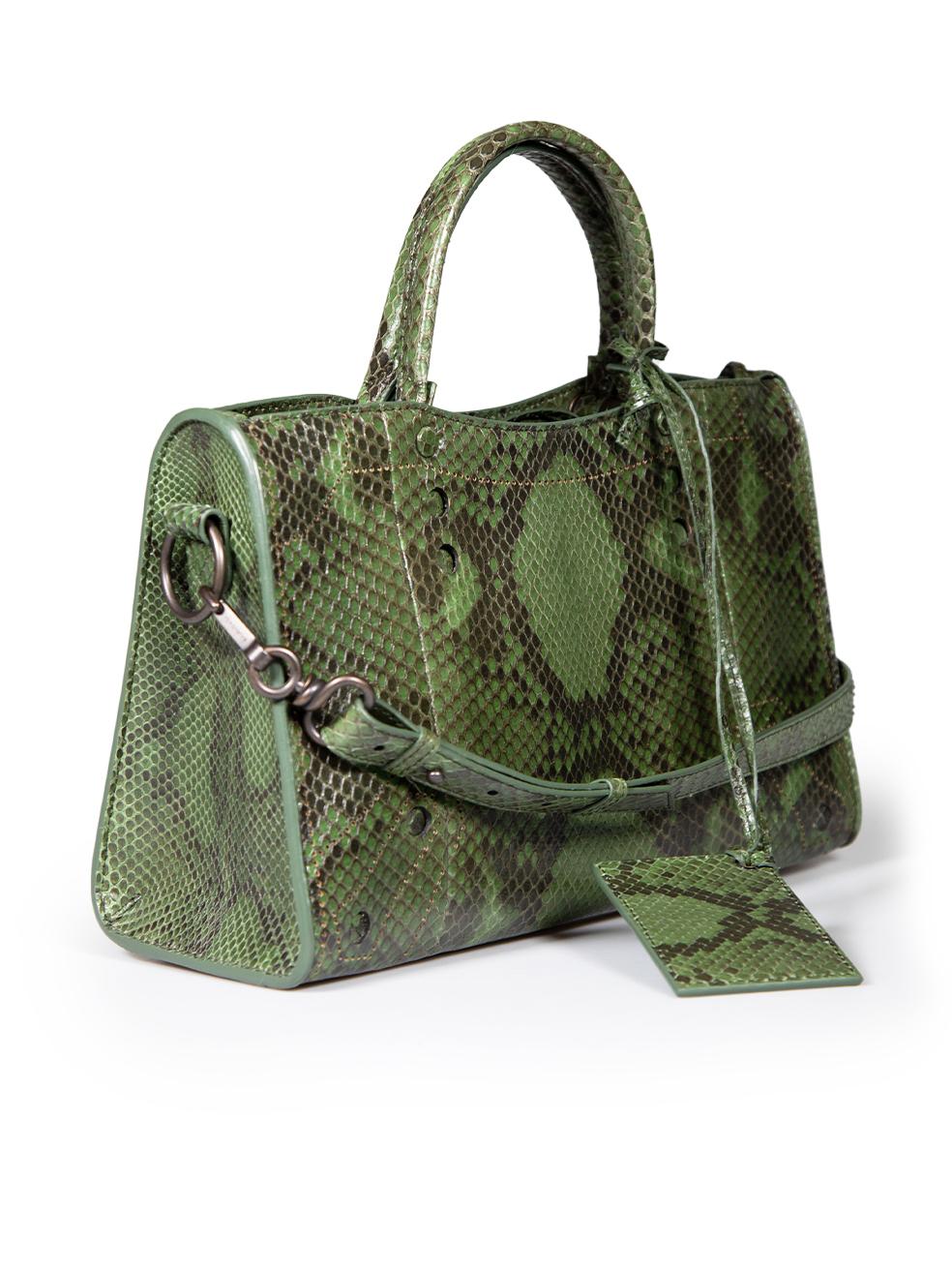 CONDITION is Very good. Minimal wear to bag is evident. Minimal wear to hardware with minor tarnishing on this used Balenciaga designer resale item.
 
 
 
 Details
 
 
 Model: City
 
 Green
 
 Snakeskin
 
 Medium handbag
 
 2x Rolled top handles
 

