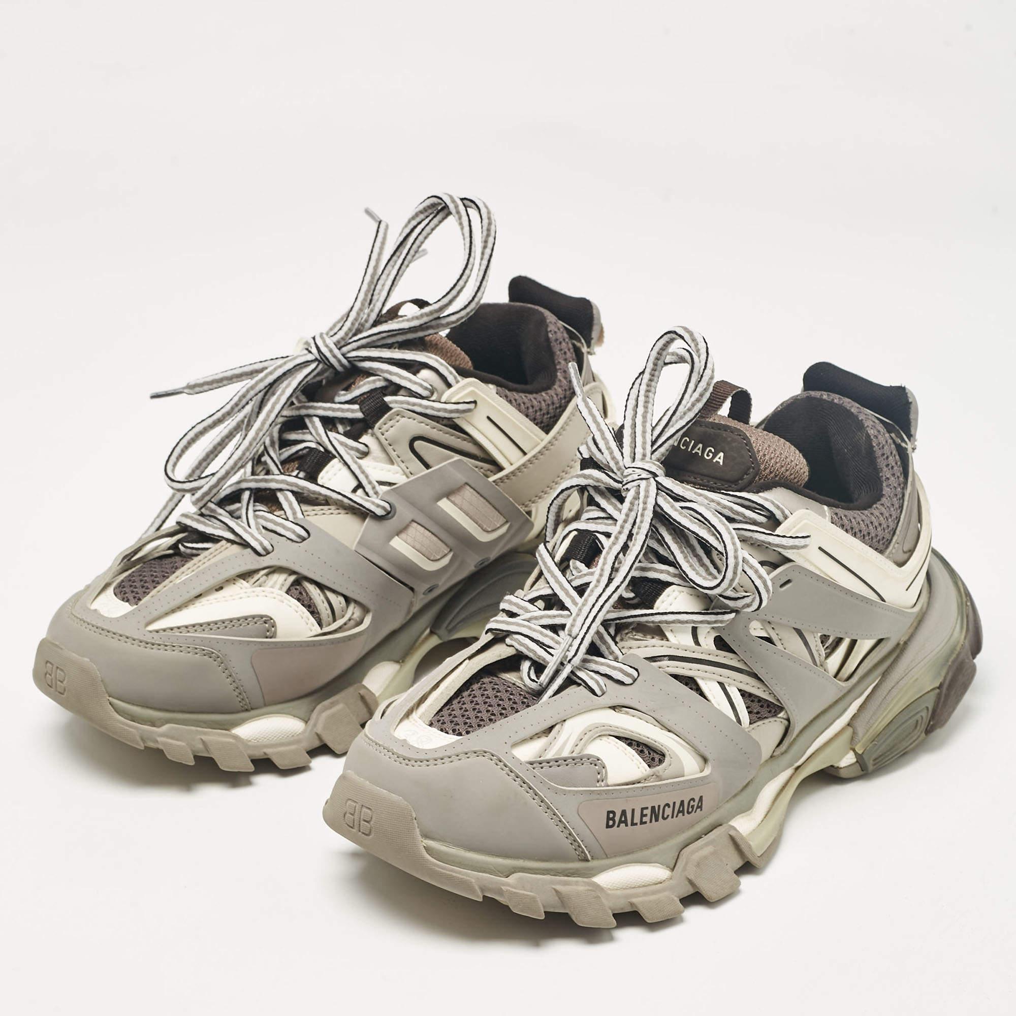 Elevate your footwear game with these Balenciaga sneakers. Combining high end aesthetics and unmatched comfort these sneakers are a symbol of modern luxury and impeccable taste.