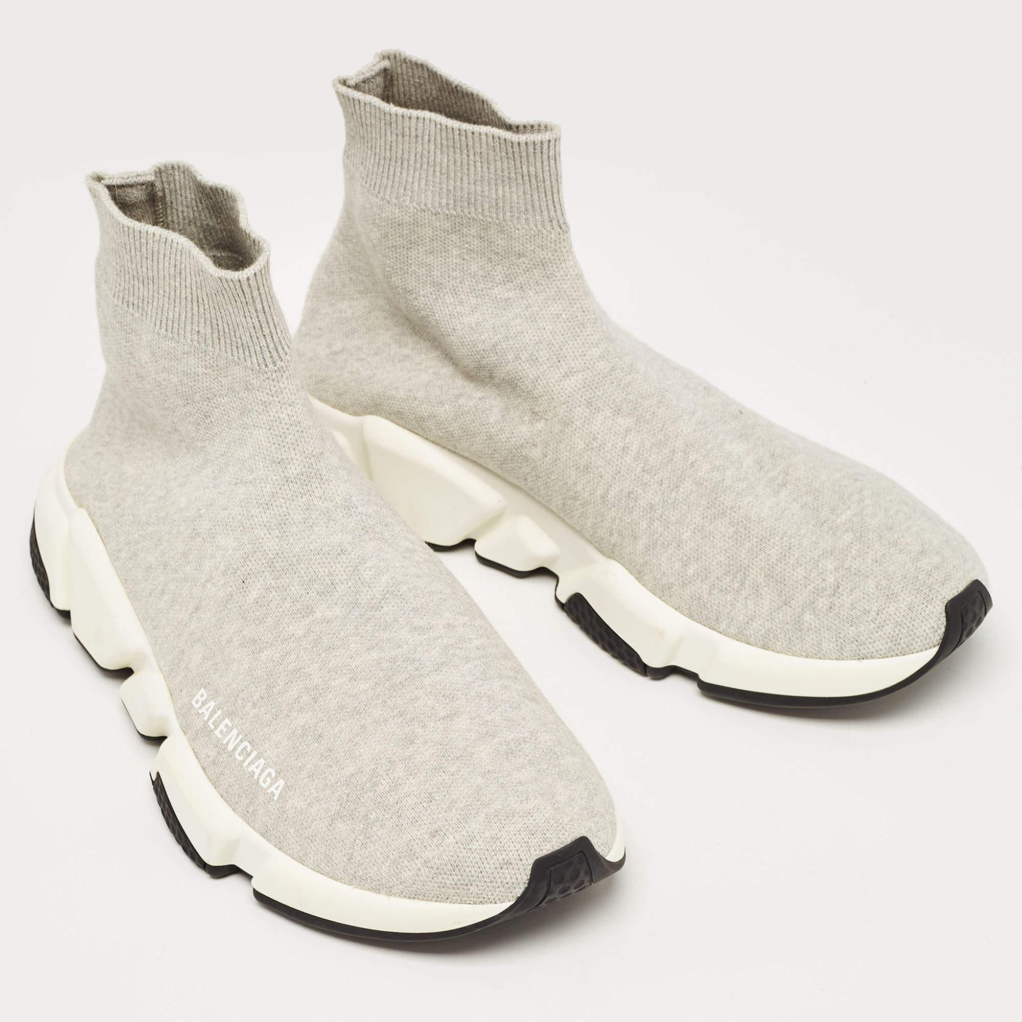 Elevate your footwear game with these Balenciaga sneakers. Combining high-end aesthetics and unmatched comfort, these sneakers are a symbol of modern luxury and impeccable taste.

