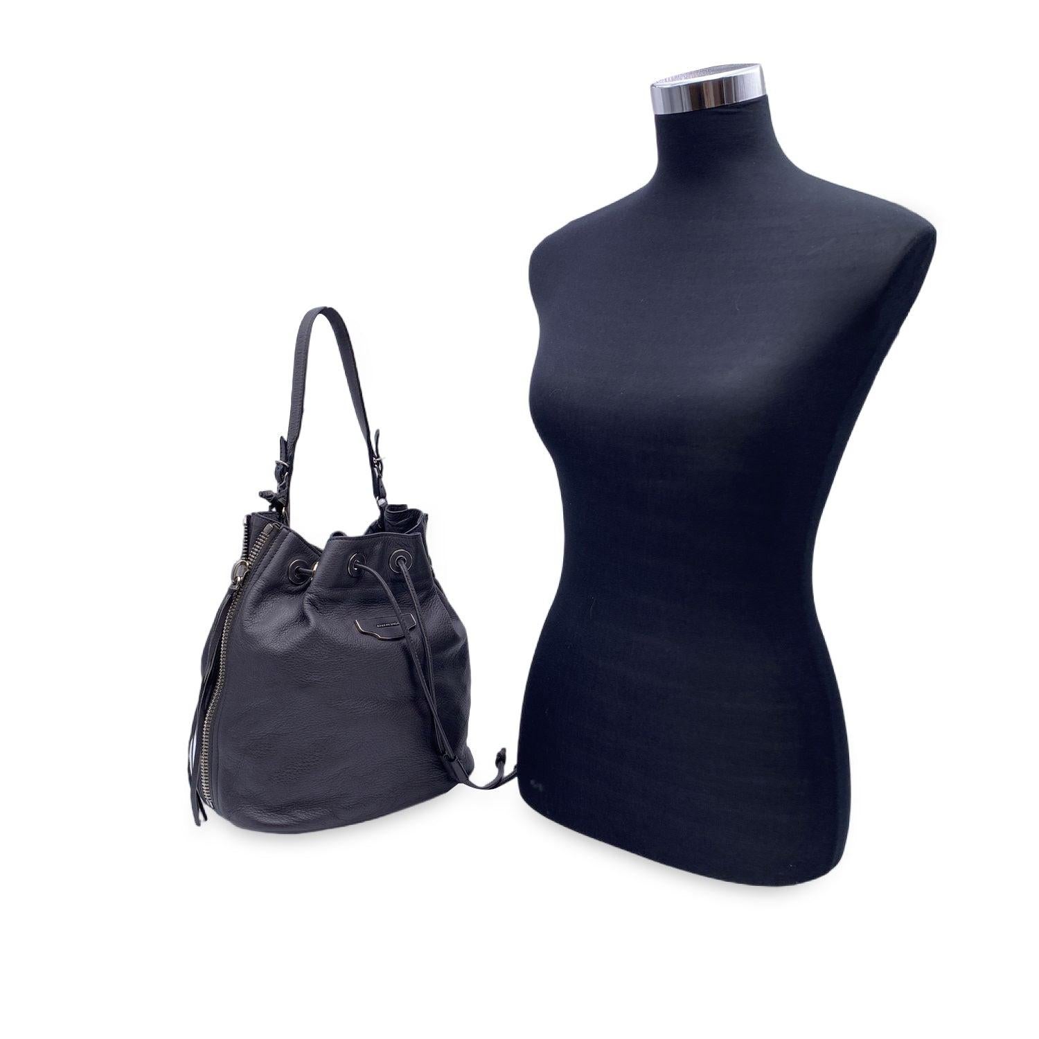 This beautiful Bag will come with a Certificate of Authenticity provided by Entrupy. The certificate will be provided at no further cost Introducing a timeless treasure, the Balenciaga Grey Leather Papier Plate Bucket Bag-an iconic blend of