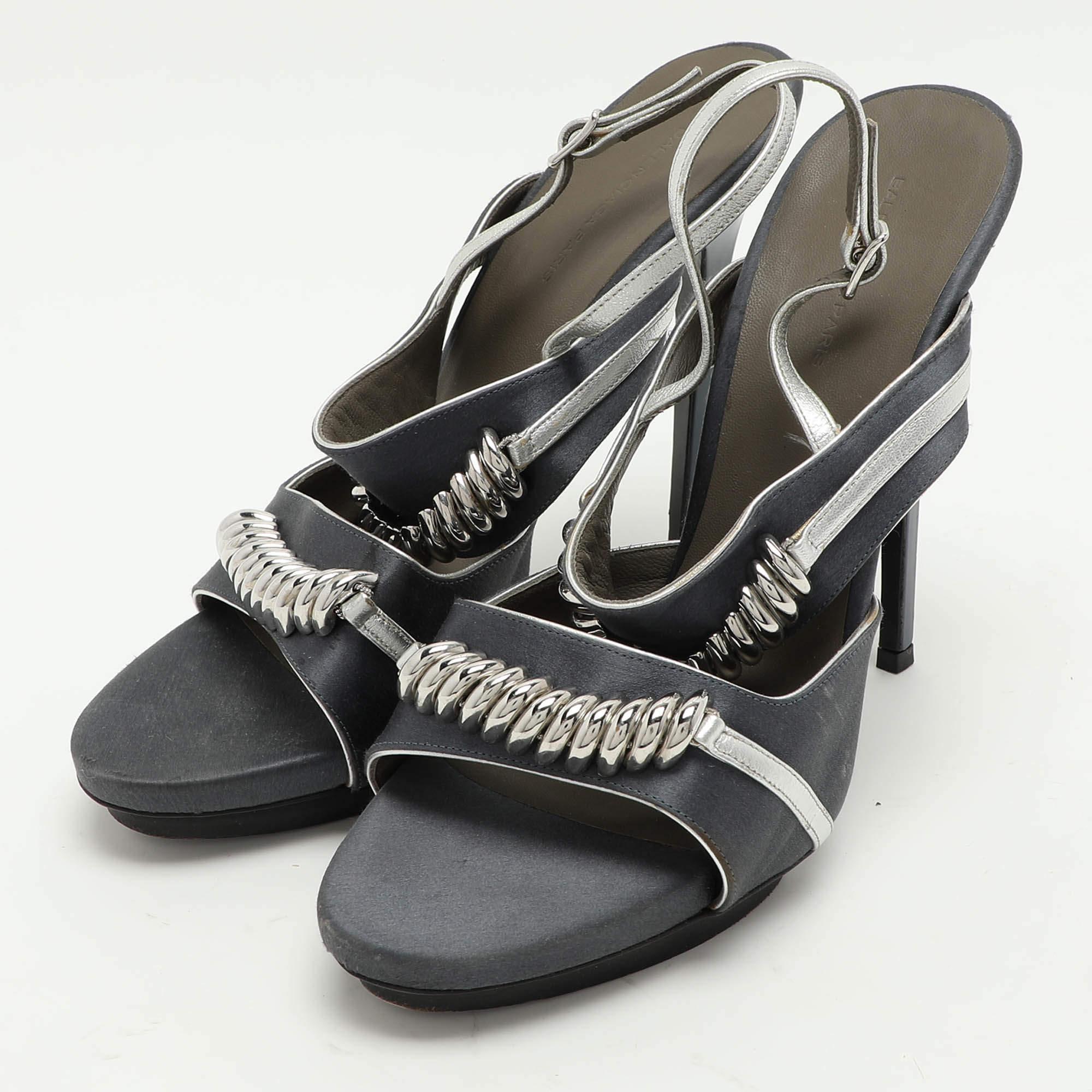 These grey slingback sandals from Balenciaga are meant to be a loved choice. Wonderfully crafted and balanced on 13.5 cm heels  the shoes will lift your feet in a stunning silhouette.