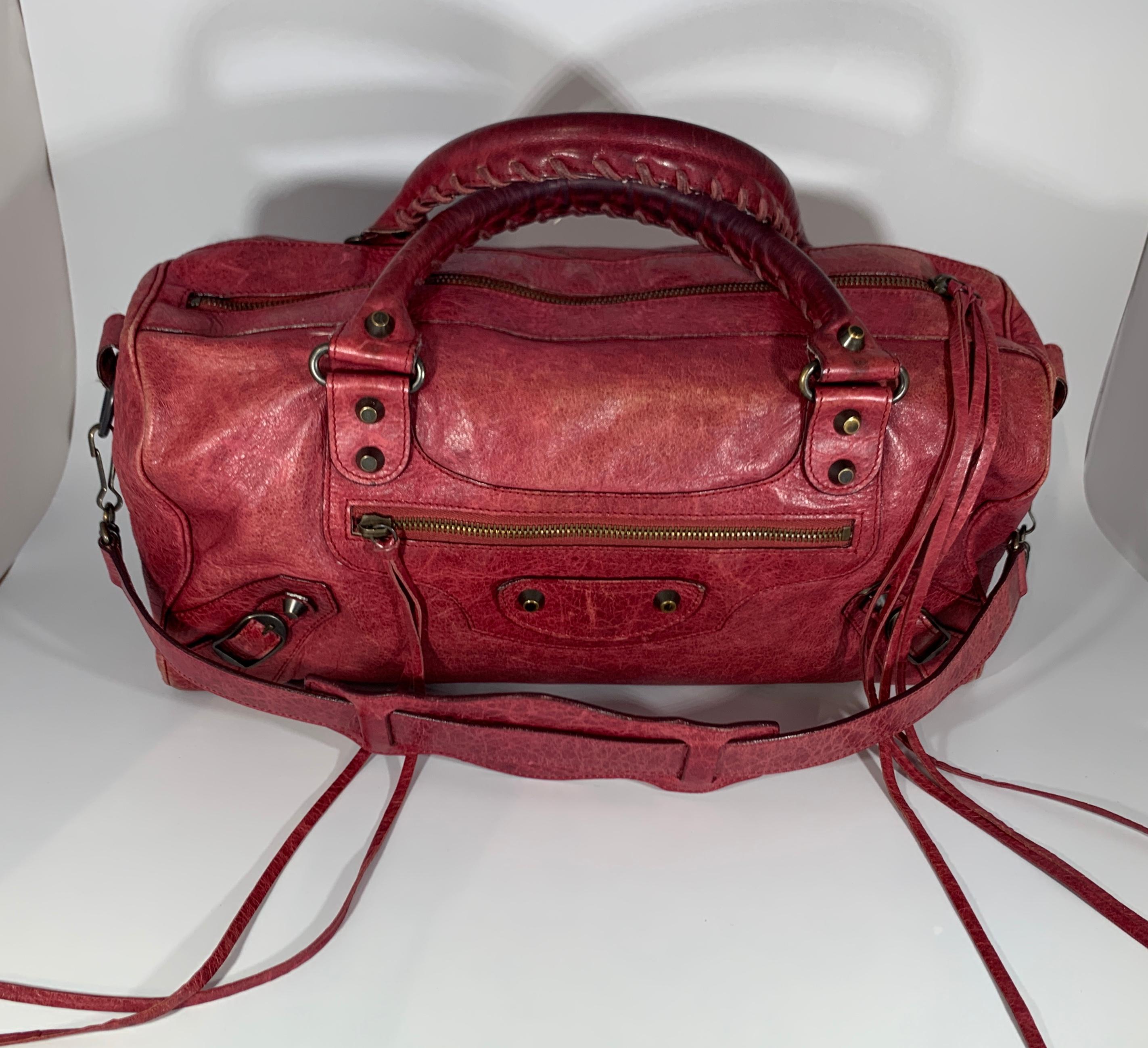 
An indispensable dresser accessory, this Balenciaga bag is surely a must have. Complement with red colour, this classy bag is all you need to flaunt your style this season. This leather bag is the first class pick for all your essentials.
The House