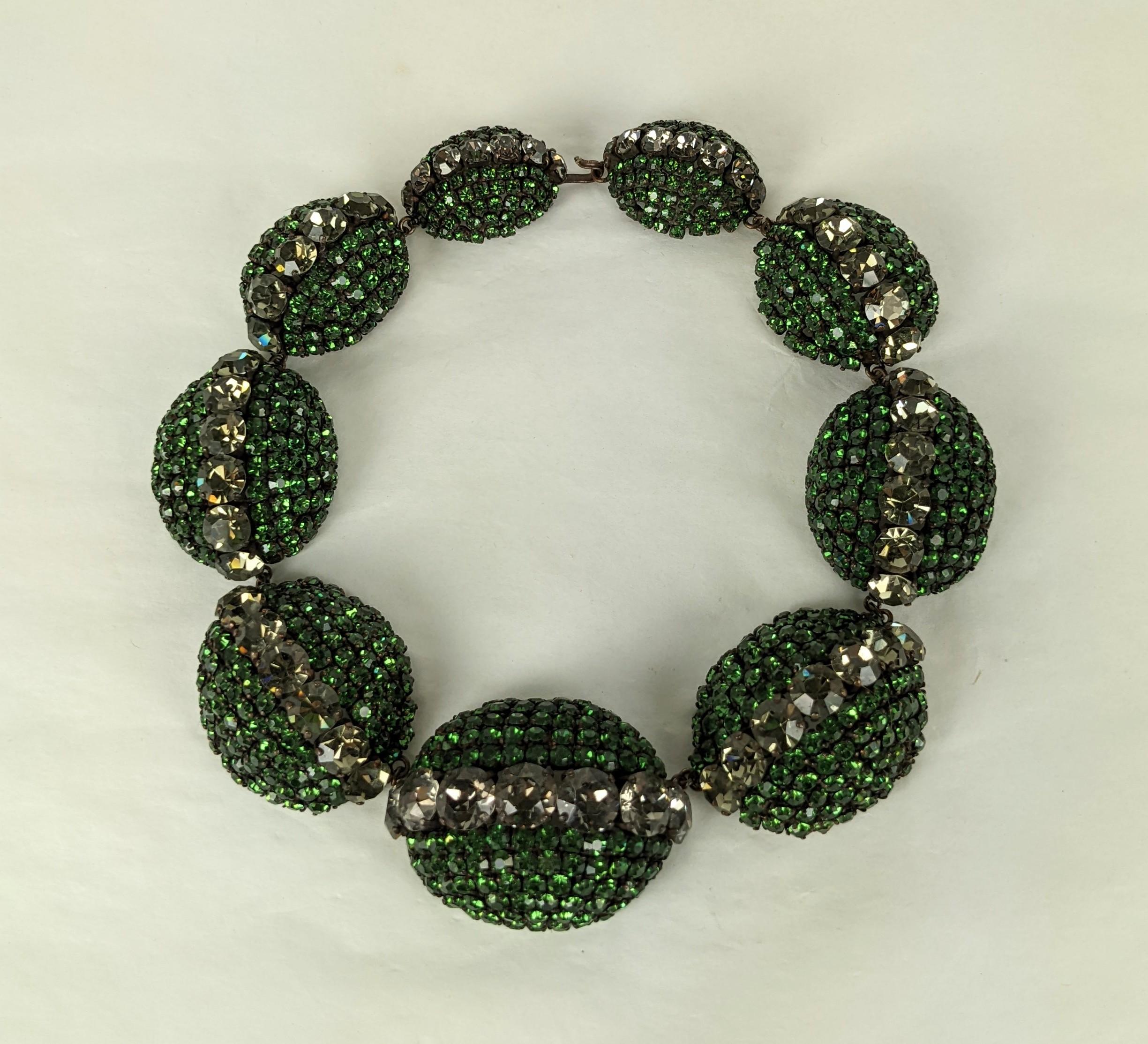 Extraordinary Balenciaga Bunny Mellon Haute Couture choker necklace. Composed of graduated eliptical domes of japanned bronze metal with hand prong set graduated olivine emerald Swarovski paste stones with and large grey crystals running down the