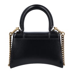 Portafoglio Balenciaga con catena "Hourglass" in nero
