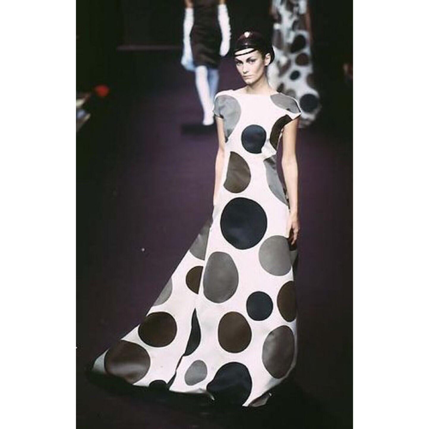 Having worked for a several prominent couture houses such as Chanel and Patou, Josephus Thimister brought his modernist design style to the house of Balenciaga. In the Fall/Winter 1997 collection, Thimister introduced sleek, satin gowns that evoked