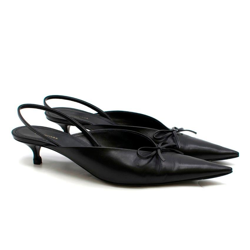 Balenciaga Black Slingback Leather Pumps

- Black slingback leather pumps
- Pointed toe
- Front dainty bow detail
- Elasticated slingback strap
- 40mm kitten heel
- Black leather lining with logo embroidered

Please note, these items are pre-owned