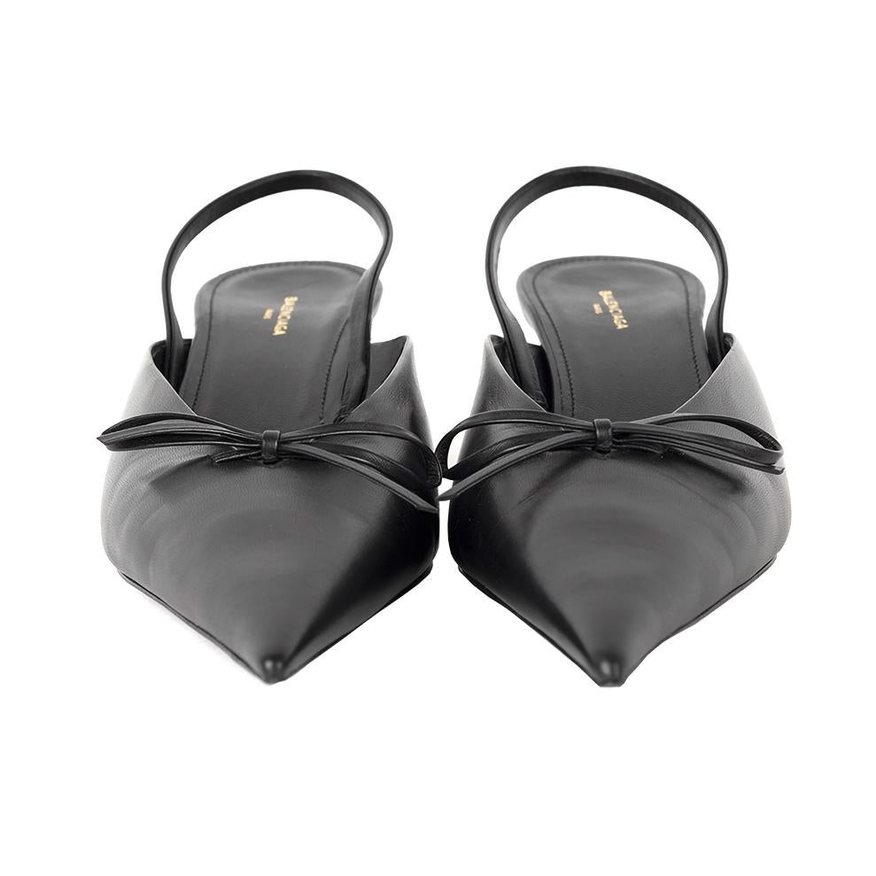 Balenciaga black leather mules shoes features a ribbon detail and sling back strap.

Length - 30 cm
Heel - 5 cm
