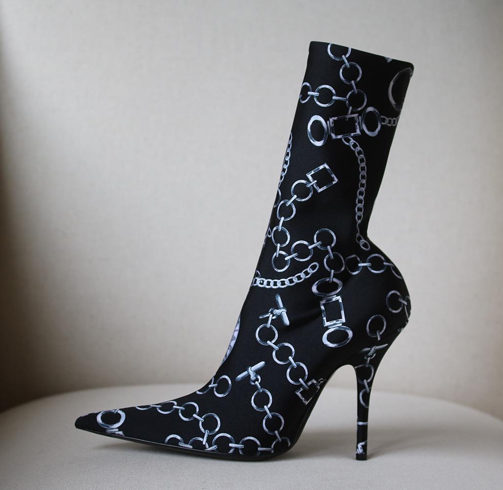 If any fashion influencer made a list of this season's coolest ankle boots, Balenciaga's 'Knife' pair would likely top it. Part of a collection designed just for us, this version is made from black and off-white chain-print spandex woven with enough