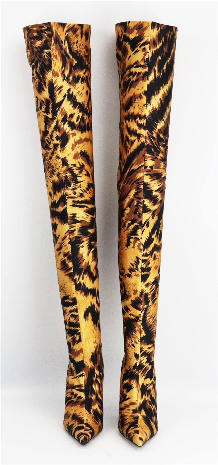 These ‘Knife’ boots by Balenciaga have a second-skin silhouette, they’re cut to reach the top of the thighs with black, brown and tan tiger-print spandex, and finished with the brand’s signature extreme-point toe and stiletto heel. Heel measures