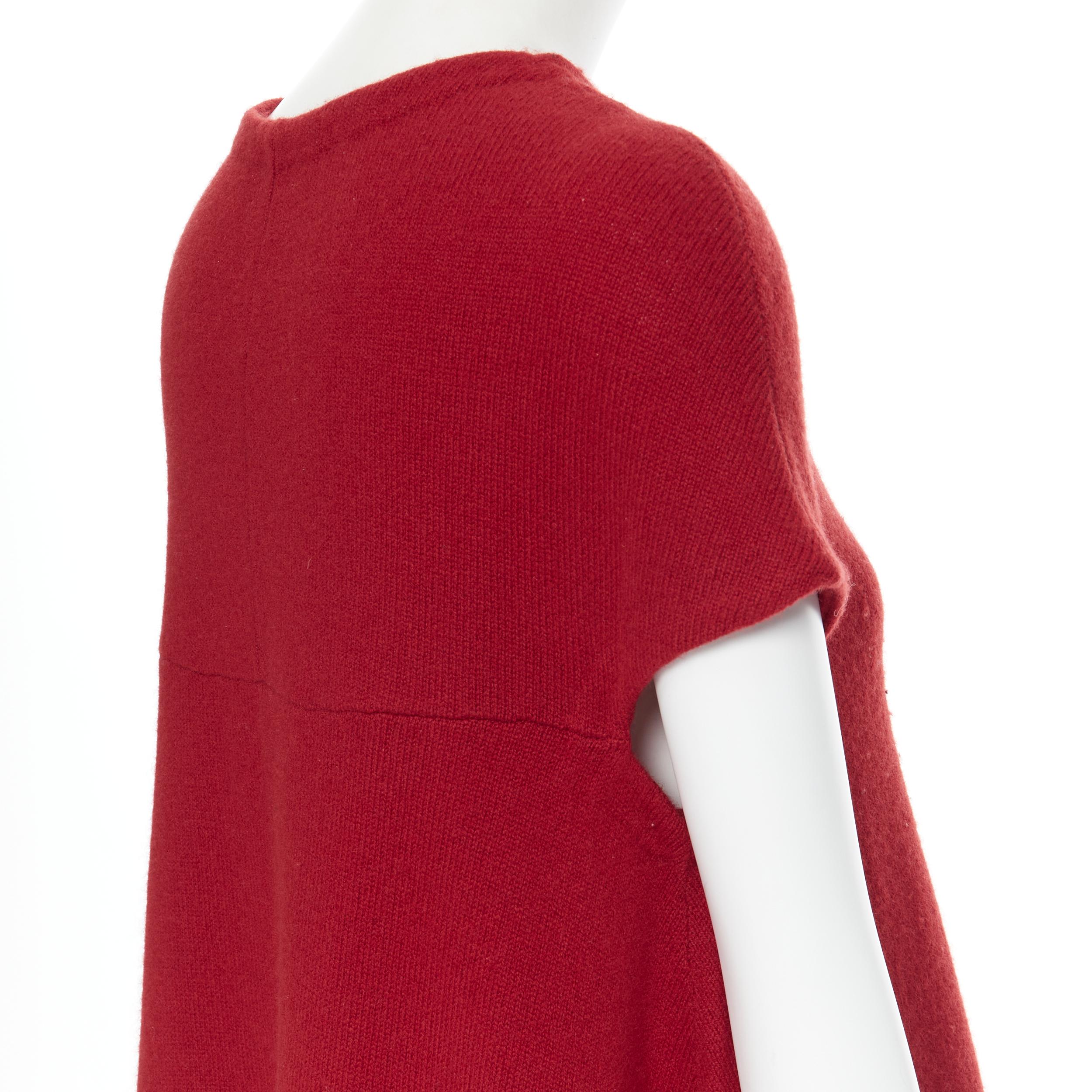 BALENCIAGA Knits 2011 100% wool red round neck cap sleeve trapeze dress Fr36 S Reference: AEMA/A00025 
Brand: Balenciaga 
Material: Wool 
Color: Red 
Pattern: Solid 
Extra Detail: Round neck. Cap sleeve. Trapeze Aline silhouette. 
Made in: China