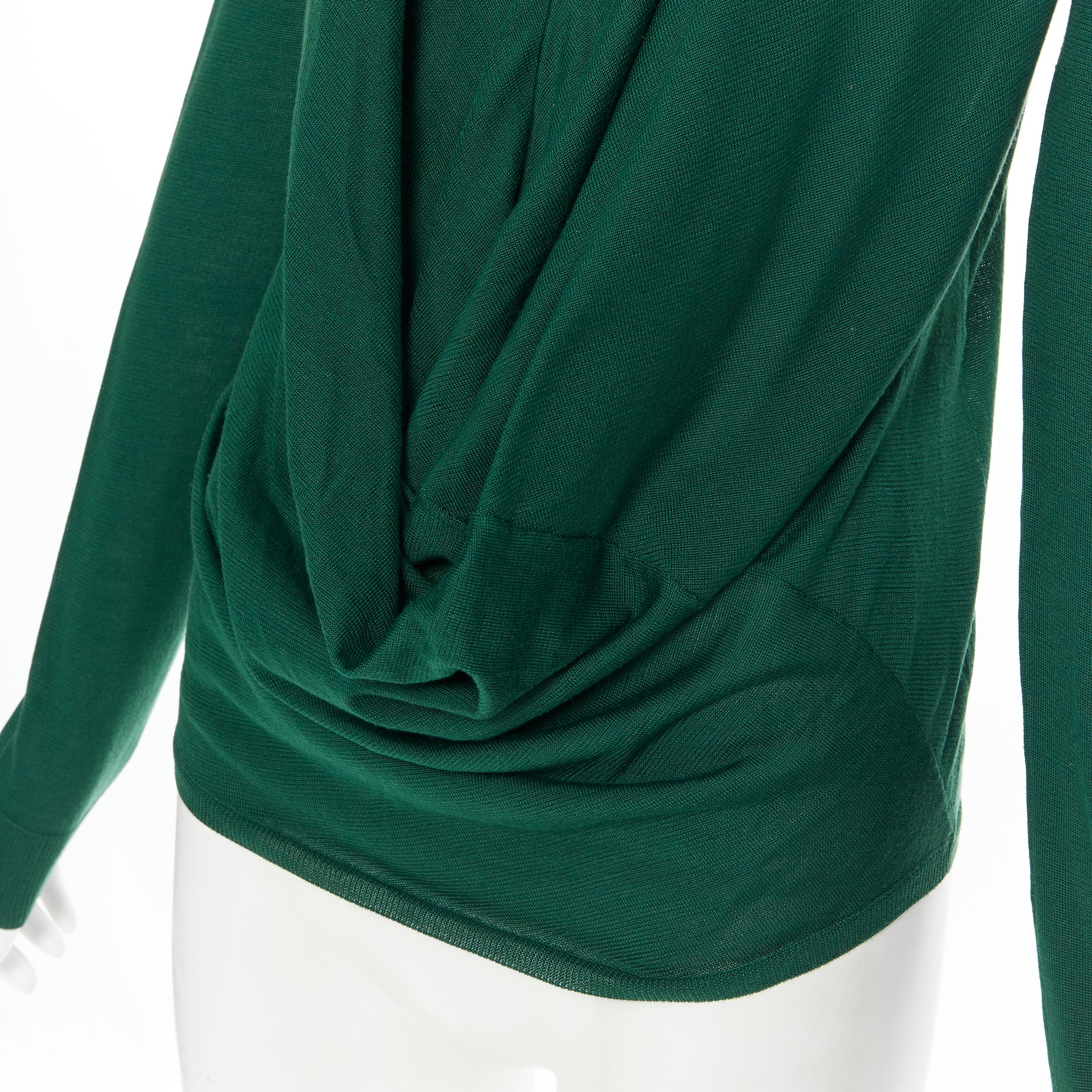 BALENCIAGA Knits Kelly green V-neck draped front long sleeve sweater top Fr36 S 
Reference: AEMA/A00035 
Brand: Balenciaga 
Material: Unknown 
Color: Green 
Pattern: Solid 
Extra Detail: V-neck. Draped front. Long sleeves. 
Made in: China