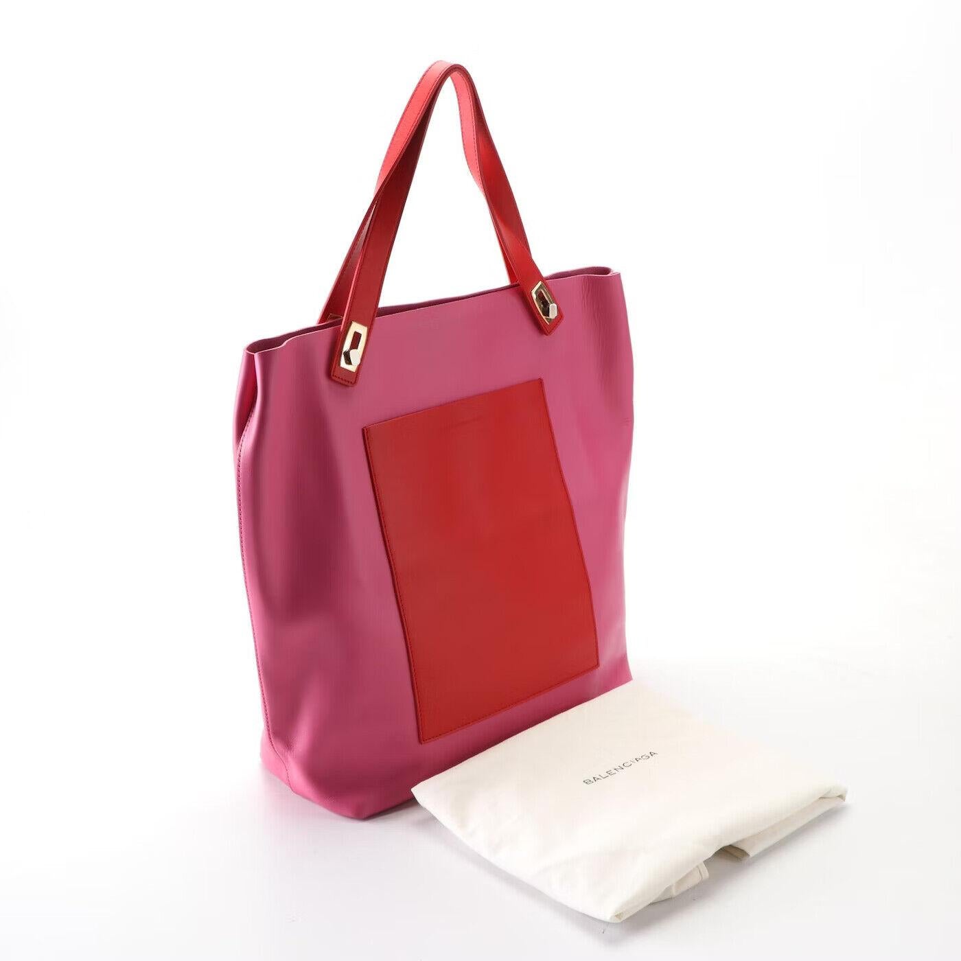 Stunning Balenciaga Tote
 Like New Store Display

Calfskin Leather
Pink & Red

2013 Spring/Summer collection
2013 Date Code

12.0