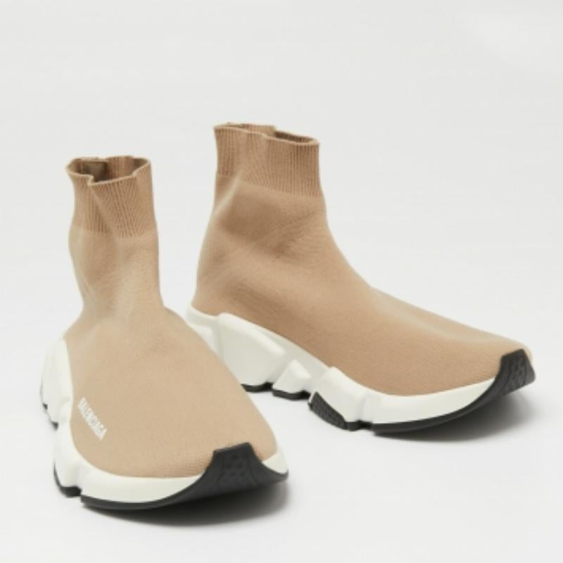 Comfortable and bouncy, these Balenciaga Trainer sneakers will prove to be a great support to your feet. Designed in a sock style, they come made from knit fabric and are instantly recognizable with the brand logo on the side. The durable rubber
