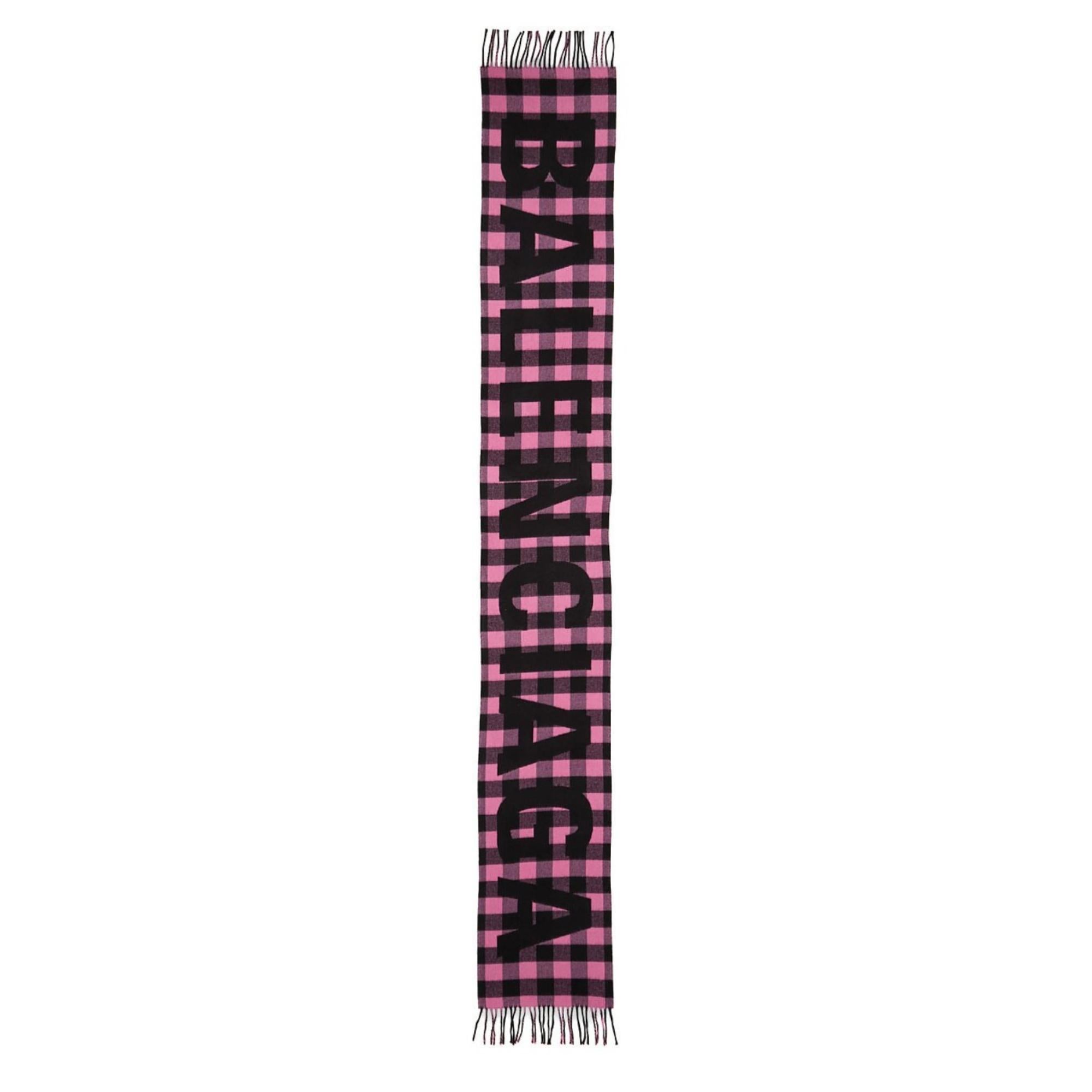 Black and pink check scarf with “Balenciaga” lettering.

COLOR: Black and pink
MATERIAL: Wool
ITEM CODE: 614831 32080 5950
MEASURES: L 88” x W 12.5” and 3” fringes
COMES WITH: Box
CONDITION: Excellent - item is pristine. Like new.

Made in Italy