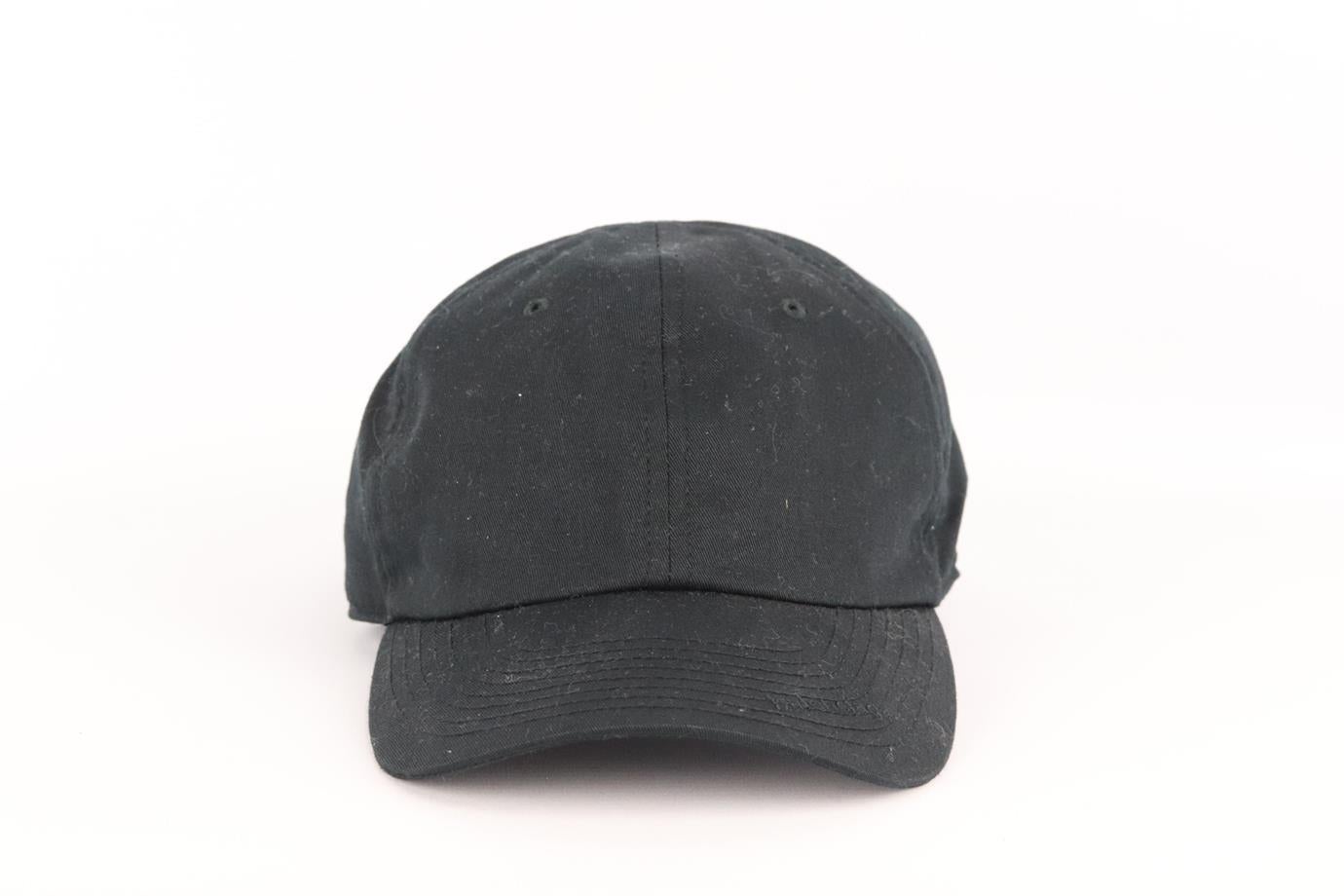 Balenciaga logo embroidered cotton twill baseball cap. Black. Fastening at back. 100% Cotton. Does not come with dustbag or box. Size: Large (58 cm). Brim Width: 2.8 in. Very good condition - No sign of wear; see pictures.