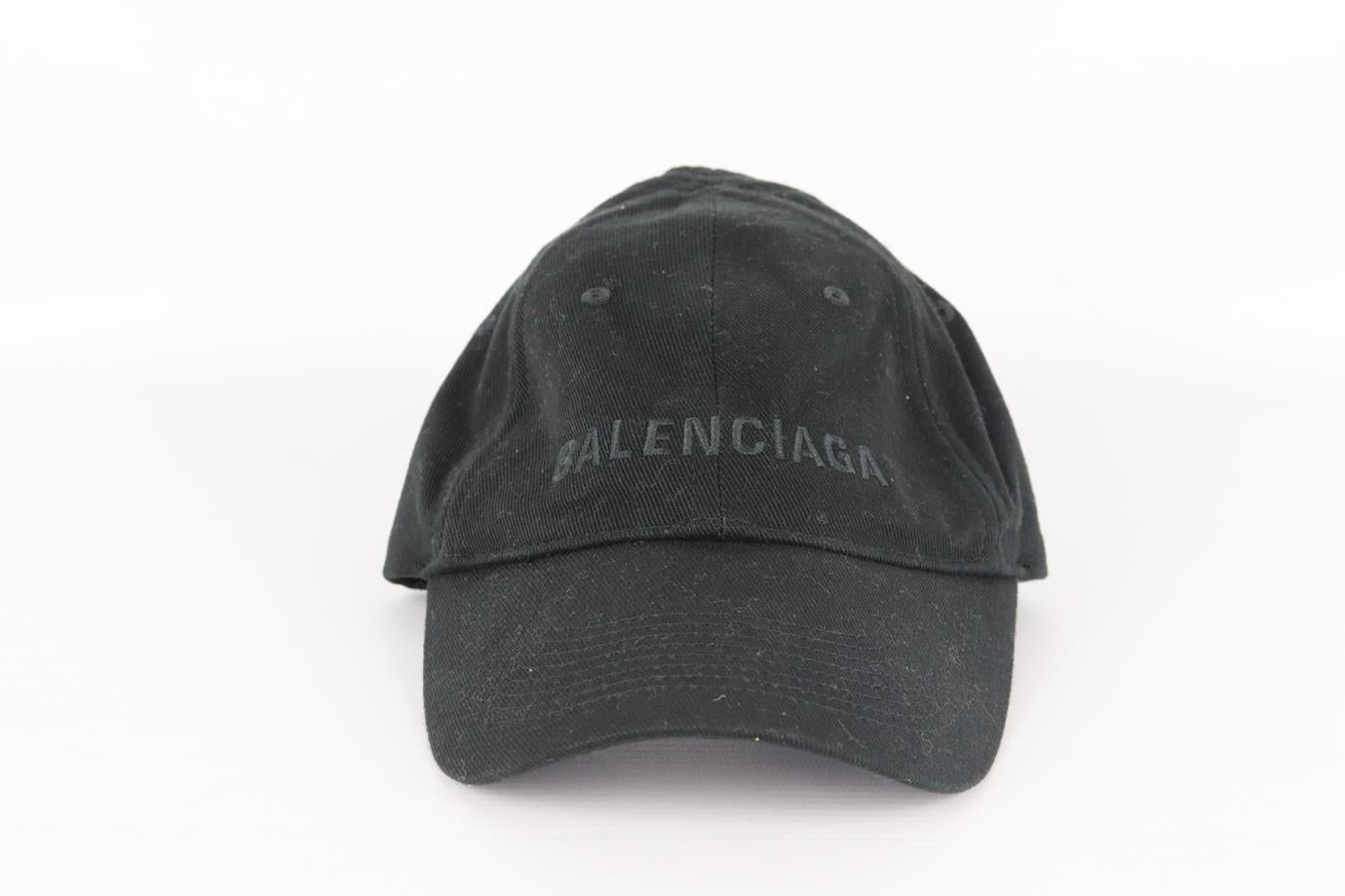 Balenciaga logo embroidered cotton twill baseball cap. Black. Fastening at back. 100% Cotton; fabric2: 100% polyester. Size: Large. Circumference: 22. 8 in. Brim Width: 2.9 in. Very good condition - No signs of wear; see pictures.
