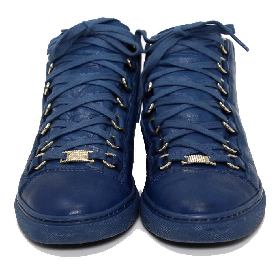 Balenciaga Matte Effect Lambskin Leather Arena Men's Sneakers Size 38

Balenciaga's Arena sneakers are something of a cult classic, and this blue version is particularly slick. In a high-top silhouette, they've been crafted in Spain from grain
